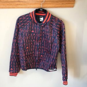 Adidas zip up with a jersey-like back detail